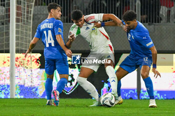 2024-09-09 - Raoul Bellanova (Italy) in action against Roy Revivo (Israel) during the UEFA Nations League match between Italy vs. Israele on 9th September 2024 at the Bozsik Arena stadium in Budapest, Hungary - ISRAEL VS ITALY - UEFA NATIONS LEAGUE - SOCCER