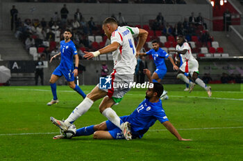 2024-09-09 - Alessandro Buongiorno (Italy) in action against Denny Gropper (Israel) during the UEFA Nations League match between Italy vs. Israele on 9th September 2024 at the Bozsik Arena stadium in Budapest, Hungary - ISRAEL VS ITALY - UEFA NATIONS LEAGUE - SOCCER