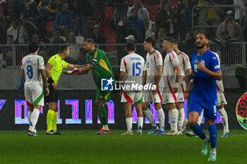 2024-09-09 - Gianluigi Donnarumma (Italy) asking the VAR after Mohammad Abu Fani (Israel) scores a goal during the UEFA Nations League match between Italy vs. Israele on 9th September 2024 at the Bozsik Arena stadium in Budapest, Hungary - ISRAEL VS ITALY - UEFA NATIONS LEAGUE - SOCCER