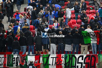 2024-09-09 - Italy supporters protest during the Israel anthem for the UEFA Nations League match between Italy vs. Israele on 9th September 2024 at the Bozsik Arena stadium in Budapest, Hungary - ISRAEL VS ITALY - UEFA NATIONS LEAGUE - SOCCER