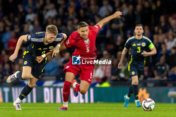 2024-09-05 - Scott McTominay of Scotland during the UEFA Nations League match between Scotland and Poland. The National Stadium, Hampden Park, Glasgow, Scotland. 05/09/2024. Photo Colin Poultney /ProSportsImages / DPPI - FOOTBALL - UEFA NATIONS LEAGUE - SCOTLAND V POLAND - UEFA NATIONS LEAGUE - SOCCER