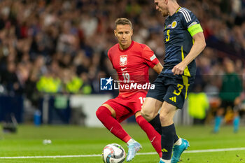 2024-09-05 - Przemysław Frankowski of Poland during the UEFA Nations League match between Scotland and Poland. The National Stadium, Hampden Park, Glasgow, Scotland. 05/09/2024. Photo Colin Poultney /ProSportsImages / DPPI - FOOTBALL - UEFA NATIONS LEAGUE - SCOTLAND V POLAND - UEFA NATIONS LEAGUE - SOCCER