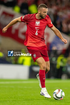 2024-09-05 - Sebastian Walukiewicz of Poland during the UEFA Nations League match between Scotland and Poland. The National Stadium, Hampden Park, Glasgow, Scotland. 05/09/2024. Photo Colin Poultney /ProSportsImages / DPPI - FOOTBALL - UEFA NATIONS LEAGUE - SCOTLAND V POLAND - UEFA NATIONS LEAGUE - SOCCER