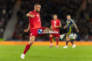 2024-09-05 - Sebastian Walukiewicz of Poland during the UEFA Nations League match between Scotland and Poland. The National Stadium, Hampden Park, Glasgow, Scotland. 05/09/2024. Photo Colin Poultney /ProSportsImages / DPPI - FOOTBALL - UEFA NATIONS LEAGUE - SCOTLAND V POLAND - UEFA NATIONS LEAGUE - SOCCER