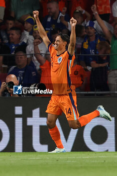 2024-09-07 - Tijjani Reijnders of Netherlands celebrates his goa during the UEFA Nations League match between Netherlands and Bosnia & Herzegovina at Philips Stadion on September 7, 2024 in Eindhoven, Netherlands - FOOTBALL - NATIONS LEAGUE - NETHERLANDS V BOSNIA - UEFA NATIONS LEAGUE - SOCCER