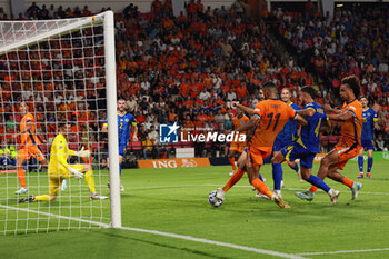 2024-09-07 - Cody Gakpo of Netherlands shoots to scores his first goal during the UEFA Nations League match between Netherlands and Bosnia & Herzegovina at Philips Stadion on September 7, 2024 in Eindhoven, Netherlands - FOOTBALL - NATIONS LEAGUE - NETHERLANDS V BOSNIA - UEFA NATIONS LEAGUE - SOCCER