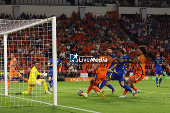 2024-09-07 - Cody Gakpo of Netherlands shoots to scores his first goal during the UEFA Nations League match between Netherlands and Bosnia & Herzegovina at Philips Stadion on September 7, 2024 in Eindhoven, Netherlands - FOOTBALL - NATIONS LEAGUE - NETHERLANDS V BOSNIA - UEFA NATIONS LEAGUE - SOCCER