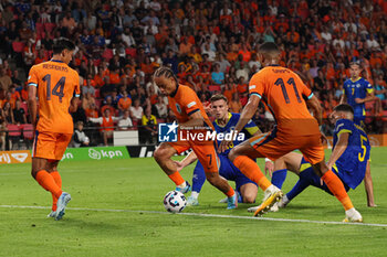 2024-09-07 - Xavi Simons of Netherlands shoots the ball during the UEFA Nations League match between Netherlands and Bosnia & Herzegovina at Philips Stadion on September 7, 2024 in Eindhoven, Netherlands - FOOTBALL - NATIONS LEAGUE - NETHERLANDS V BOSNIA - UEFA NATIONS LEAGUE - SOCCER