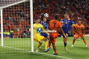 2024-09-07 - Xavi Simons of Netherlands shoots the ball during the UEFA Nations League match between Netherlands and Bosnia & Herzegovina at Philips Stadion on September 7, 2024 in Eindhoven, Netherlands - FOOTBALL - NATIONS LEAGUE - NETHERLANDS V BOSNIA - UEFA NATIONS LEAGUE - SOCCER