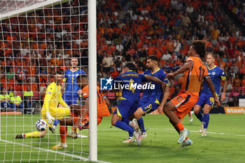 2024-09-07 - Cody Gakpo of Netherlands shoots to scores his first goal during the UEFA Nations League match between Netherlands and Bosnia & Herzegovina at Philips Stadion on September 7, 2024 in Eindhoven, Netherlands - FOOTBALL - NATIONS LEAGUE - NETHERLANDS V BOSNIA - UEFA NATIONS LEAGUE - SOCCER