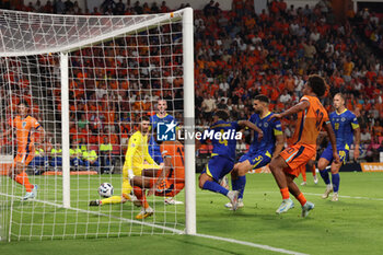 2024-09-07 - Cody Gakpo of Netherlands shoots to scores his first goal during the UEFA Nations League match between Netherlands and Bosnia & Herzegovina at Philips Stadion on September 7, 2024 in Eindhoven, Netherlands - FOOTBALL - NATIONS LEAGUE - NETHERLANDS V BOSNIA - UEFA NATIONS LEAGUE - SOCCER