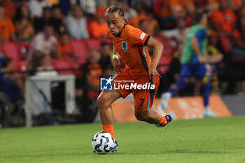 2024-09-07 - Xavi Simons of Netherlands runs with the ball during the UEFA Nations League match between Netherlands and Bosnia & Herzegovina at Philips Stadion on September 7, 2024 in Eindhoven, Netherlands - FOOTBALL - NATIONS LEAGUE - NETHERLANDS V BOSNIA - UEFA NATIONS LEAGUE - SOCCER