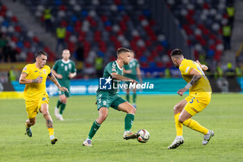 2024-09-09 - Nicolae Stanciu of Romania, Pijus Sirvys of Lithuania and Andrei Burca of Romania during the UEFA Nations League, Group stage, League C, Group C2, football match between Romania and Lithuania on 9 September 2024 at Stadionul Steaua in Bucharest, Romania - FOOTBALL - UEFA NATIONS LEAGUE - ROMANIA V LITHUANIA - UEFA NATIONS LEAGUE - SOCCER