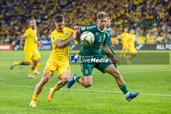 2024-09-09 - Dennis Man of Romania fighting for the ball with Artemijus Tutyskinas of Lithuania during the UEFA Nations League, Group stage, League C, Group C2, football match between Romania and Lithuania on 9 September 2024 at Stadionul Steaua in Bucharest, Romania - FOOTBALL - UEFA NATIONS LEAGUE - ROMANIA V LITHUANIA - UEFA NATIONS LEAGUE - SOCCER