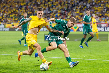 2024-09-09 - Dennis Man of Romania fighting for the ball with Artemijus Tutyskinas of Lithuania during the UEFA Nations League, Group stage, League C, Group C2, football match between Romania and Lithuania on 9 September 2024 at Stadionul Steaua in Bucharest, Romania - FOOTBALL - UEFA NATIONS LEAGUE - ROMANIA V LITHUANIA - UEFA NATIONS LEAGUE - SOCCER