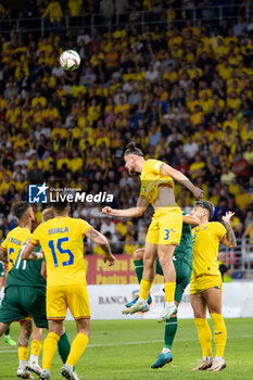 2024-09-09 - Radu Dragusin of Romania fighting for the ball during the UEFA Nations League, Group stage, League C, Group C2, football match between Romania and Lithuania on 9 September 2024 at Stadionul Steaua in Bucharest, Romania - FOOTBALL - UEFA NATIONS LEAGUE - ROMANIA V LITHUANIA - UEFA NATIONS LEAGUE - SOCCER