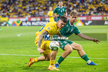 2024-09-09 - Dennis Man of Romania fighting for the ball with Artemijus Tutyskinas of Lithuania during the UEFA Nations League, Group stage, League C, Group C2, football match between Romania and Lithuania on 9 September 2024 at Stadionul Steaua in Bucharest, Romania - FOOTBALL - UEFA NATIONS LEAGUE - ROMANIA V LITHUANIA - UEFA NATIONS LEAGUE - SOCCER