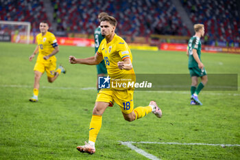 2024-09-09 - Razvan Marin of Romania celebrates after he scores his team's second goal to make the score 2-1 during the UEFA Nations League, Group stage, League C, Group C2, football match between Romania and Lithuania on 9 September 2024 at Stadionul Steaua in Bucharest, Romania - FOOTBALL - UEFA NATIONS LEAGUE - ROMANIA V LITHUANIA - UEFA NATIONS LEAGUE - SOCCER