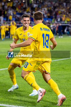 2024-09-09 - Ianis Hagi of Romania and Razvan Marin of Romania celebrate after Razvan Marin of Romania scores his team's second goal to make the score 2-1 during the UEFA Nations League, Group stage, League C, Group C2, football match between Romania and Lithuania on 9 September 2024 at Stadionul Steaua in Bucharest, Romania - FOOTBALL - UEFA NATIONS LEAGUE - ROMANIA V LITHUANIA - UEFA NATIONS LEAGUE - SOCCER