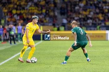 2024-09-09 - Andrei Ratiu of Romania and Artemijus Tutyskinas of Lithuania during the UEFA Nations League, Group stage, League C, Group C2, football match between Romania and Lithuania on 9 September 2024 at Stadionul Steaua in Bucharest, Romania - FOOTBALL - UEFA NATIONS LEAGUE - ROMANIA V LITHUANIA - UEFA NATIONS LEAGUE - SOCCER