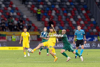 2024-09-09 - Dennis Man of Romania and Modestas Vorobjovas of Lithuania fighting for the ball during the UEFA Nations League, Group stage, League C, Group C2, football match between Romania and Lithuania on 9 September 2024 at Stadionul Steaua in Bucharest, Romania - FOOTBALL - UEFA NATIONS LEAGUE - ROMANIA V LITHUANIA - UEFA NATIONS LEAGUE - SOCCER