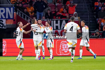 2024-09-10 - Deniz Undav of Germany celebrates after scoring his sides first goal during the UEFA Nations League 2024/2025 League A Group 3 match between Netherlands and Germany at Johan Cruijff ArenA on September 10, 2024 in Amsterdam, Netherlands. Photo Andre Weening/ Orange Pictures / DPPI - FOOTBALL - NATIONS LEAGUE - NETHERLANDS V GERMANY - UEFA NATIONS LEAGUE - SOCCER