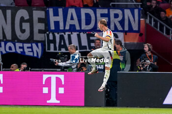 2024-09-10 - Joshua Kimmich of Germany celebrates after scoring his sides second goal during the UEFA Nations League 2024/2025 League A Group 3 match between Netherlands and Germany at Johan Cruijff ArenA on September 10, 2024 in Amsterdam, Netherlands. Photo Andre Weening/ Orange Pictures / DPPI - FOOTBALL - NATIONS LEAGUE - NETHERLANDS V GERMANY - UEFA NATIONS LEAGUE - SOCCER