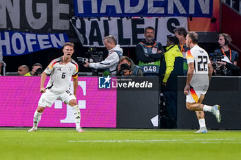 2024-09-10 - Joshua Kimmich of Germany celebrates after scoring his sides second goal during the UEFA Nations League 2024/2025 League A Group 3 match between Netherlands and Germany at Johan Cruijff ArenA on September 10, 2024 in Amsterdam, Netherlands. Photo Andre Weening/ Orange Pictures / DPPI - FOOTBALL - NATIONS LEAGUE - NETHERLANDS V GERMANY - UEFA NATIONS LEAGUE - SOCCER