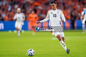 2024-09-10 - Jamal Musiala of Germany runs with the ball during the UEFA Nations League 2024/2025 League A Group 3 match between Netherlands and Germany at Johan Cruijff ArenA on September 10, 2024 in Amsterdam, Netherlands. Photo Andre Weening/ Orange Pictures / DPPI - FOOTBALL - NATIONS LEAGUE - NETHERLANDS V GERMANY - UEFA NATIONS LEAGUE - SOCCER