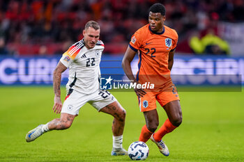 2024-09-10 - Denzel Dumfries of Netherlands is challenged by David Raum of Germany during the UEFA Nations League 2024/2025 League A Group 3 match between Netherlands and Germany at Johan Cruijff ArenA on September 10, 2024 in Amsterdam, Netherlands. Photo Andre Weening/ Orange Pictures / DPPI - FOOTBALL - NATIONS LEAGUE - NETHERLANDS V GERMANY - UEFA NATIONS LEAGUE - SOCCER