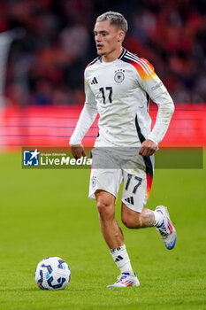 2024-09-10 - Florian Wirtz of Germany runs with the ball during the UEFA Nations League 2024/2025 League A Group 3 match between Netherlands and Germany at Johan Cruijff ArenA on September 10, 2024 in Amsterdam, Netherlands. Photo Andre Weening/ Orange Pictures / DPPI - FOOTBALL - NATIONS LEAGUE - NETHERLANDS V GERMANY - UEFA NATIONS LEAGUE - SOCCER