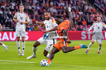 2024-09-10 - Brian Brobbey of Netherlands is challenged by Jonathan Tah of Germany during the UEFA Nations League 2024/2025 League A Group 3 match between Netherlands and Germany at Johan Cruijff ArenA on September 10, 2024 in Amsterdam, Netherlands. Photo Andre Weening/ Orange Pictures / DPPI - FOOTBALL - NATIONS LEAGUE - NETHERLANDS V GERMANY - UEFA NATIONS LEAGUE - SOCCER