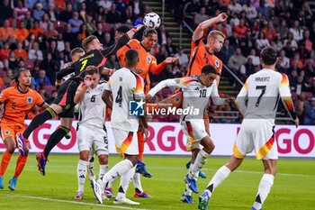 2024-09-10 - goalkeeper Marc-Andre ter Stegen of Germany battles for the ball with Virgil van Dijk of Netherlands during the UEFA Nations League 2024/2025 League A Group 3 match between Netherlands and Germany at Johan Cruijff ArenA on September 10, 2024 in Amsterdam, Netherlands. Photo Andre Weening/ Orange Pictures / DPPI - FOOTBALL - NATIONS LEAGUE - NETHERLANDS V GERMANY - UEFA NATIONS LEAGUE - SOCCER