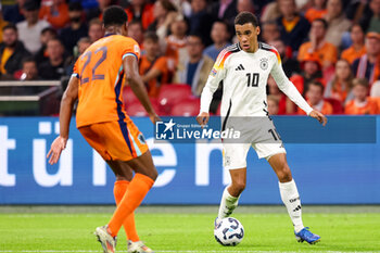 2024-09-10 - Jamal Musiala of Germany during the UEFA Nations League 2024/2025 League A Group 3 match between Netherlands and Germany at Johan Cruijff ArenA on September 10, 2024 in Amsterdam, Netherlands. Photo Peter Lous/ Orange Pictures / DPPI - FOOTBALL - NATIONS LEAGUE - NETHERLANDS V GERMANY - UEFA NATIONS LEAGUE - SOCCER