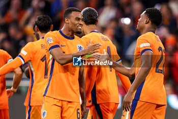 2024-09-10 - Ryan Gravenberch of the Netherlands, Virgil van Dijk of the Netherlands, Denzel Dumfries of the Netherlands celebrates after scoring his teams second goal during the UEFA Nations League 2024/2025 League A Group 3 match between Netherlands and Germany at Johan Cruijff ArenA on September 10, 2024 in Amsterdam, Netherlands. Photo Peter Lous/ Orange Pictures / DPPI - FOOTBALL - NATIONS LEAGUE - NETHERLANDS V GERMANY - UEFA NATIONS LEAGUE - SOCCER