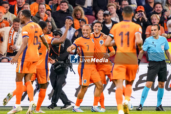 2024-09-10 - Tijjani Reijnders of Netherlands celebrates after scoring his sides first goal with Xavi Simons of Netherlands during the UEFA Nations League 2024/2025 League A Group 3 match between Netherlands and Germany at Johan Cruijff ArenA on September 10, 2024 in Amsterdam, Netherlands. Photo Andre Weening/ Orange Pictures / DPPI - FOOTBALL - NATIONS LEAGUE - NETHERLANDS V GERMANY - UEFA NATIONS LEAGUE - SOCCER