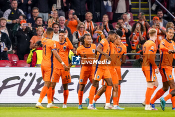 2024-09-10 - Tijjani Reijnders of Netherlands celebrates after scoring his sides first goal with team during the UEFA Nations League 2024/2025 League A Group 3 match between Netherlands and Germany at Johan Cruijff ArenA on September 10, 2024 in Amsterdam, Netherlands. Photo Andre Weening/ Orange Pictures / DPPI - FOOTBALL - NATIONS LEAGUE - NETHERLANDS V GERMANY - UEFA NATIONS LEAGUE - SOCCER