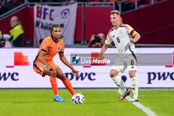 2024-09-10 - Joshua Kimmich of Germany is challenged by Nathan Ake of Netherlands during the UEFA Nations League 2024/2025 League A Group 3 match between Netherlands and Germany at Johan Cruijff ArenA on September 10, 2024 in Amsterdam, Netherlands. Photo Andre Weening/ Orange Pictures / DPPI - FOOTBALL - NATIONS LEAGUE - NETHERLANDS V GERMANY - UEFA NATIONS LEAGUE - SOCCER