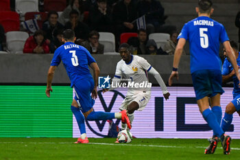 2024-10-10 - Ousmane Dembele (France) in action against Matan Baltaxa (Israel) during the UEFA Nations League match between Israel vs. France on 10th October 2024 at the Bozsik Arena stadium in Budapest, Hungary - ISRAEL VS FRANCE - UEFA NATIONS LEAGUE - SOCCER