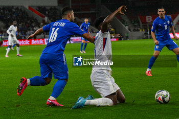 2024-10-10 - Foul of Mohammad Abu Fani (Israel) on Aurelien Djani Tchouameni (France) during the UEFA Nations League match between Israel vs. France on 10th October 2024 at the Bozsik Arena stadium in Budapest, Hungary - ISRAEL VS FRANCE - UEFA NATIONS LEAGUE - SOCCER