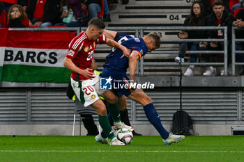 2024-10-11 - Roland Sallai (Hungary) in action against Micky van de Ven (Netherlands) during the UEFA Nations League match between Hungary vs. Holland on 11th October 2024 at the Puskas Arena stadium in Budapest, Hungary - HUNGARY VS NETHERLANDS - UEFA NATIONS LEAGUE - SOCCER