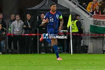 2024-10-11 - Happiness of Denzel Dumfries (Netherlands) after scores a goal during the UEFA Nations League match between Hungary vs. Holland on 11th October 2024 at the Puskas Arena stadium in Budapest, Hungary - HUNGARY VS NETHERLANDS - UEFA NATIONS LEAGUE - SOCCER