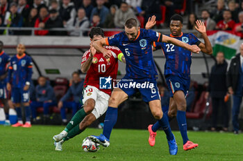 2024-10-11 - Stefan De Vrij (Netherlands)in action against Dominik Szoboszlai (Hungary) during the UEFA Nations League match between Hungary vs. Holland on 11th October 2024 at the Puskas Arena stadium in Budapest, Hungary - HUNGARY VS NETHERLANDS - UEFA NATIONS LEAGUE - SOCCER