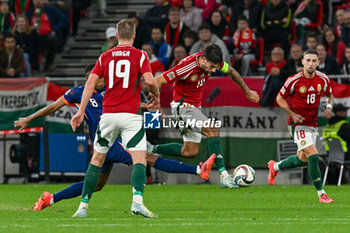 2024-10-11 - Dominik Szoboszlai (Hungary) in action against Ryan Gravenberch (Netherlands) during the UEFA Nations League match between Hungary vs. Holland on 11th October 2024 at the Puskas Arena stadium in Budapest, Hungary - HUNGARY VS NETHERLANDS - UEFA NATIONS LEAGUE - SOCCER