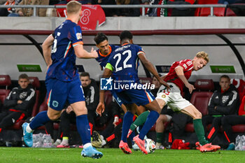 2024-10-11 - Clash between Andras Schafer (Hungary) and Denzel Dumfries (Netherlands) during the UEFA Nations League match between Hungary vs. Holland on 11th October 2024 at the Puskas Arena stadium in Budapest, Hungary - HUNGARY VS NETHERLANDS - UEFA NATIONS LEAGUE - SOCCER