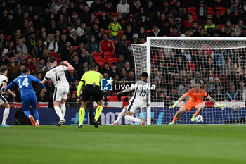 2024-10-10 - Vangelis Pavlidis (14) of Greece scores the opening goal 0-1 beating Jordan Pickford (1) of England during the UEFA Nations League, League B, Group B2 football match between England and Greece on 10 October 2024 at Wembley Stadium in London, England - FOOTBALL - UEFA NATIONS LEAGUE - ENGLAND V GREECE - UEFA NATIONS LEAGUE - SOCCER