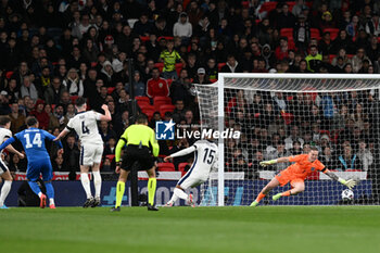 2024-10-10 - Vangelis Pavlidis (14) of Greece scores the opening goal 0-1 beating Jordan Pickford (1) of England during the UEFA Nations League, League B, Group B2 football match between England and Greece on 10 October 2024 at Wembley Stadium in London, England - FOOTBALL - UEFA NATIONS LEAGUE - ENGLAND V GREECE - UEFA NATIONS LEAGUE - SOCCER