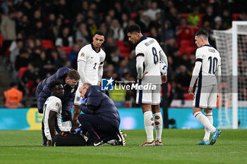 2024-10-10 - Bukayo Saka (7) of England down injured during the UEFA Nations League, League B, Group B2 football match between England and Greece on 10 October 2024 at Wembley Stadium in London, England - FOOTBALL - UEFA NATIONS LEAGUE - ENGLAND V GREECE - UEFA NATIONS LEAGUE - SOCCER