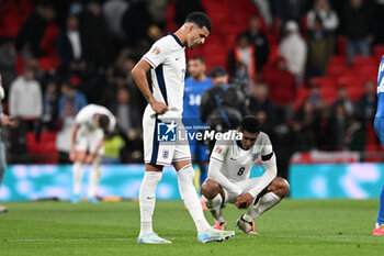 2024-10-10 - Jude Bellingham (8) and Dominic Solanke (21) of England look dejected at full time after Greece won 1-2 during the UEFA Nations League, League B, Group B2 football match between England and Greece on 10 October 2024 at Wembley Stadium in London, England - FOOTBALL - UEFA NATIONS LEAGUE - ENGLAND V GREECE - UEFA NATIONS LEAGUE - SOCCER