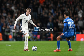 2024-10-10 - Cole Palmer (20) of England and Dimitris Giannoulis (22) of Greece during the UEFA Nations League, League B, Group B2 football match between England and Greece on 10 October 2024 at Wembley Stadium in London, England - FOOTBALL - UEFA NATIONS LEAGUE - ENGLAND V GREECE - UEFA NATIONS LEAGUE - SOCCER